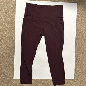 Athleta salutation stash pocket 7/8 tight MP burgundy
